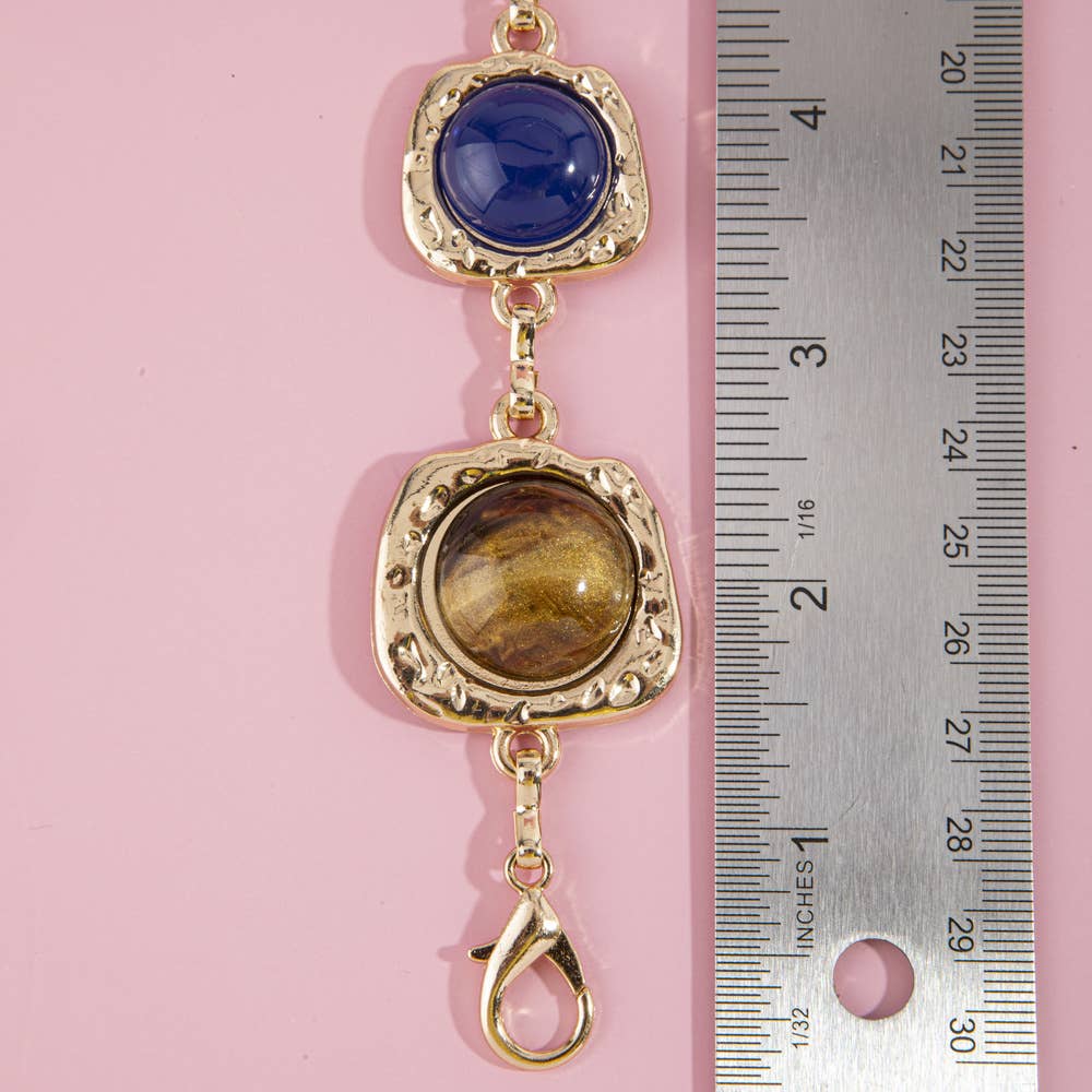 Gemstone cabochon station chain belt with colorful stones and metal links, from Collections by Fame Accessories.