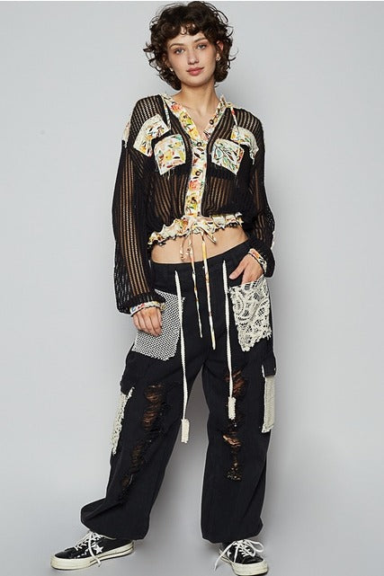 RARA Boutique floral patch open knit crochet hoodie jacket with colorful floral embroidery and relaxed fit.