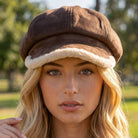 Vegan suede newsboy cabbie hat with plush trim in a classic style, designed by Collections by Fame Accessories.