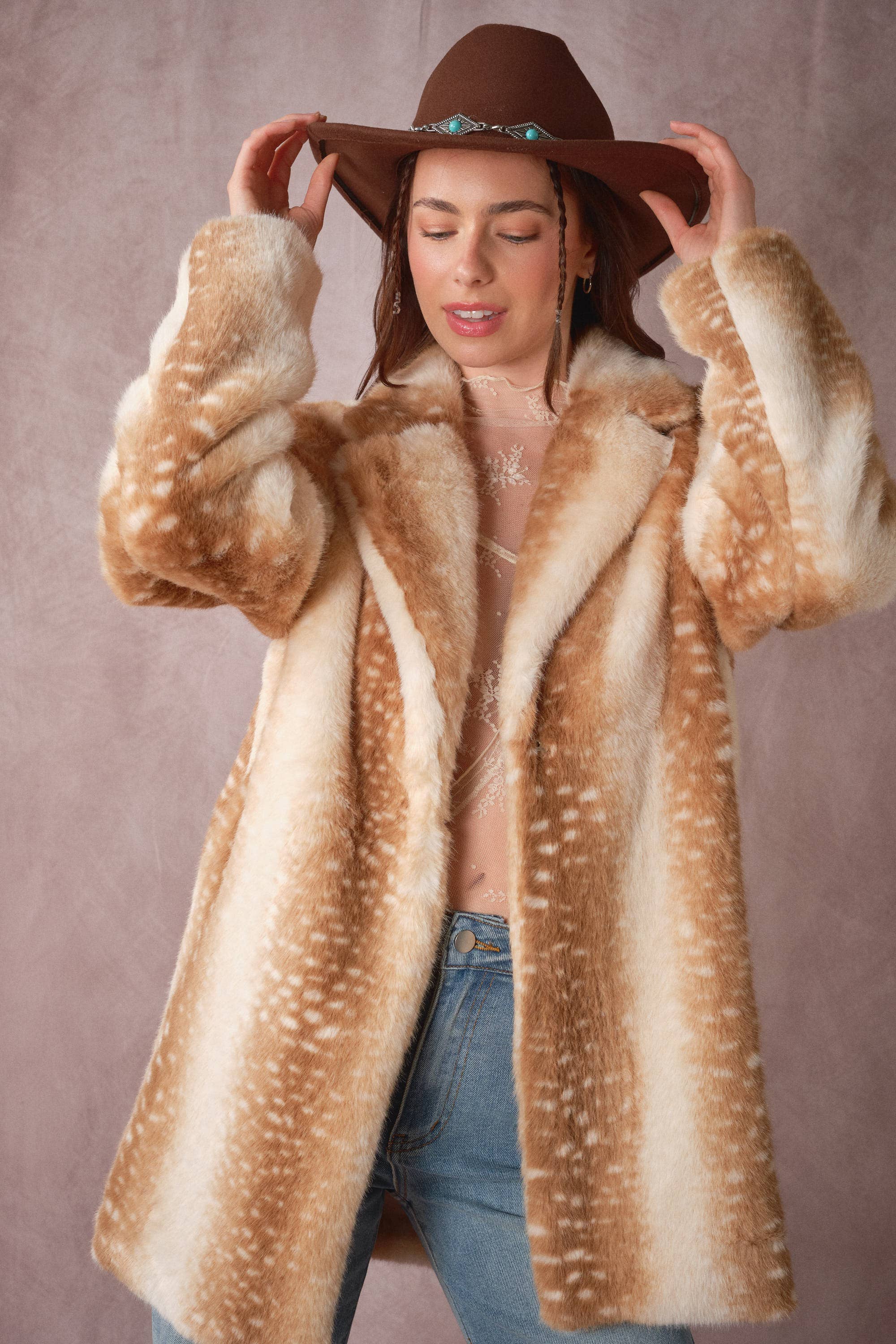 Blue B 25046J deer print faux fur coat with a plush, soft texture and stylish design, shown on a model.