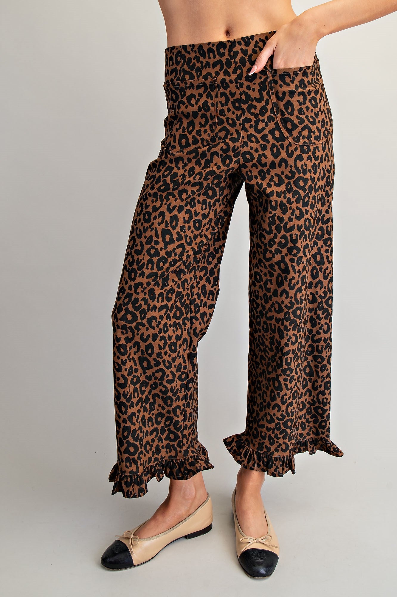 RARA Boutique DELETE Leopard Ruffle Hem Cropped Pants with leopard print and ruffled hem, trendy cropped pants for women.