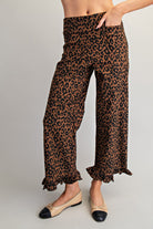 RARA Boutique DELETE Leopard Ruffle Hem Cropped Pants with leopard print and ruffled hem, trendy cropped pants for women.