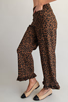 Leopard print ruffle hem cropped pants by RARA Boutique, stylish and trendy pants with a bold pattern and ruffle detail.