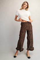 Delete Leopard Ruffle Hem Cropped Pants from RARA Boutique, featuring leopard print, ruffle hem, and cropped style.