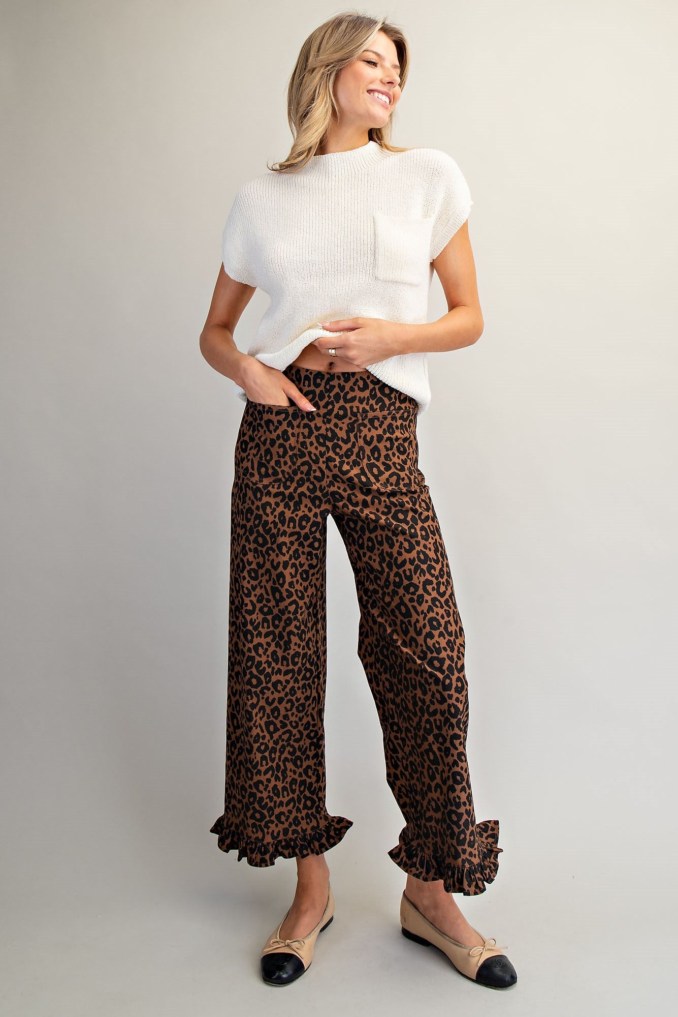 RARA Boutique DELETE Leopard Ruffle Hem Cropped Pants in black with leopard print and ruffle hem design, casual and stylish pants.