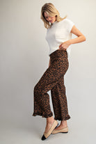 RARA Boutique DELETE leopard ruffle hem cropped pants, stylish animal print pants with ruffle details and cropped length.
