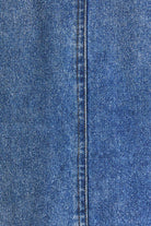 Le Lis oversized denim jacket with zipper front, featuring a relaxed fit and classic blue denim fabric.