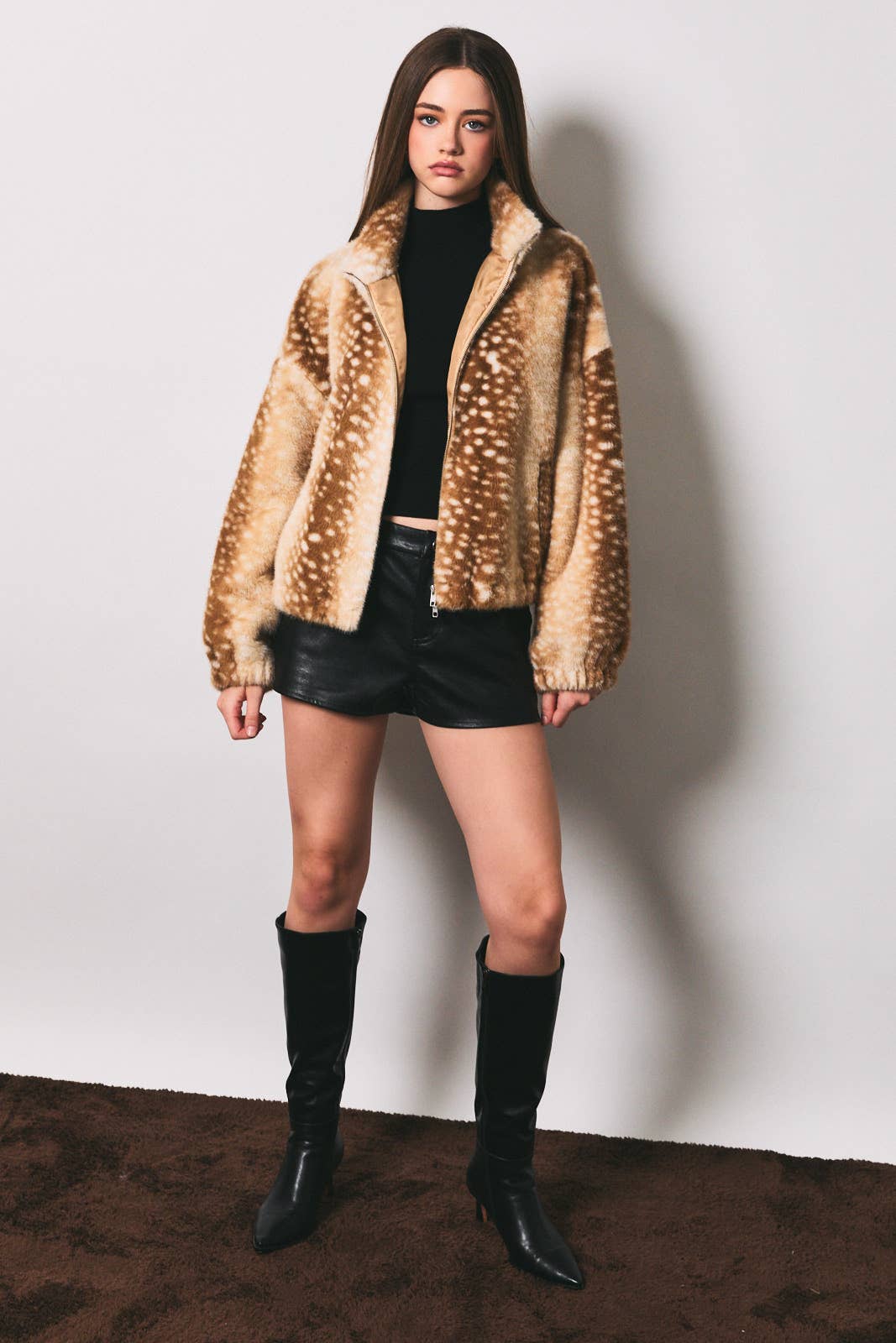 LE LIS faux deer print high neck zip jacket featuring a stylish design and high collar, shown in a close-up image.