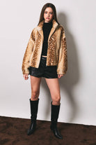 LE LIS faux deer print high neck zip jacket featuring a stylish design and high collar, shown in a close-up image.