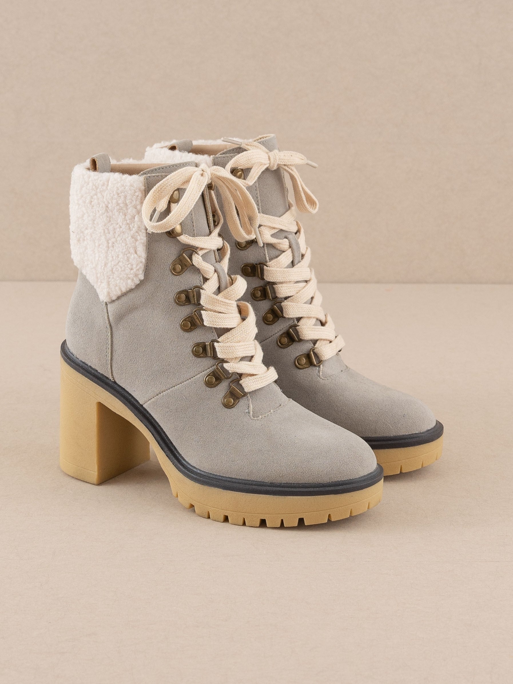 RARA Boutique heeled platform lace-up sherpa boots with chunky soles and cozy fur lining, stylish winter footwear.