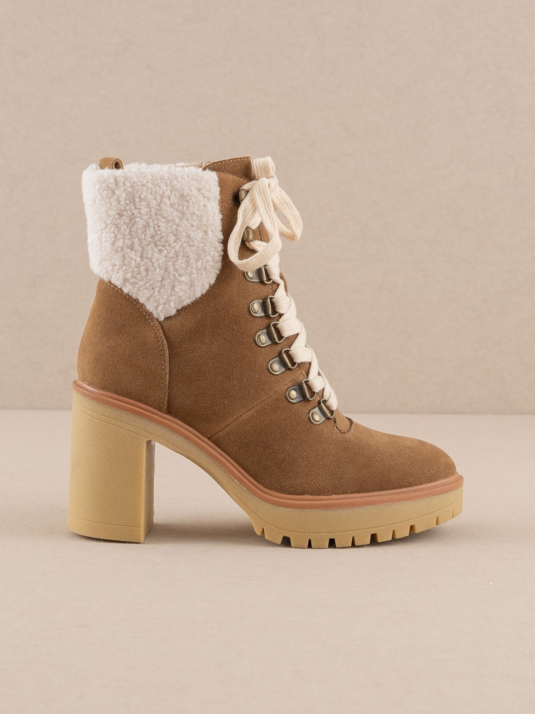 RARA Boutique heeled platform lace-up sherpa boots with chunky soles and cozy fur lining, stylish winter footwear.