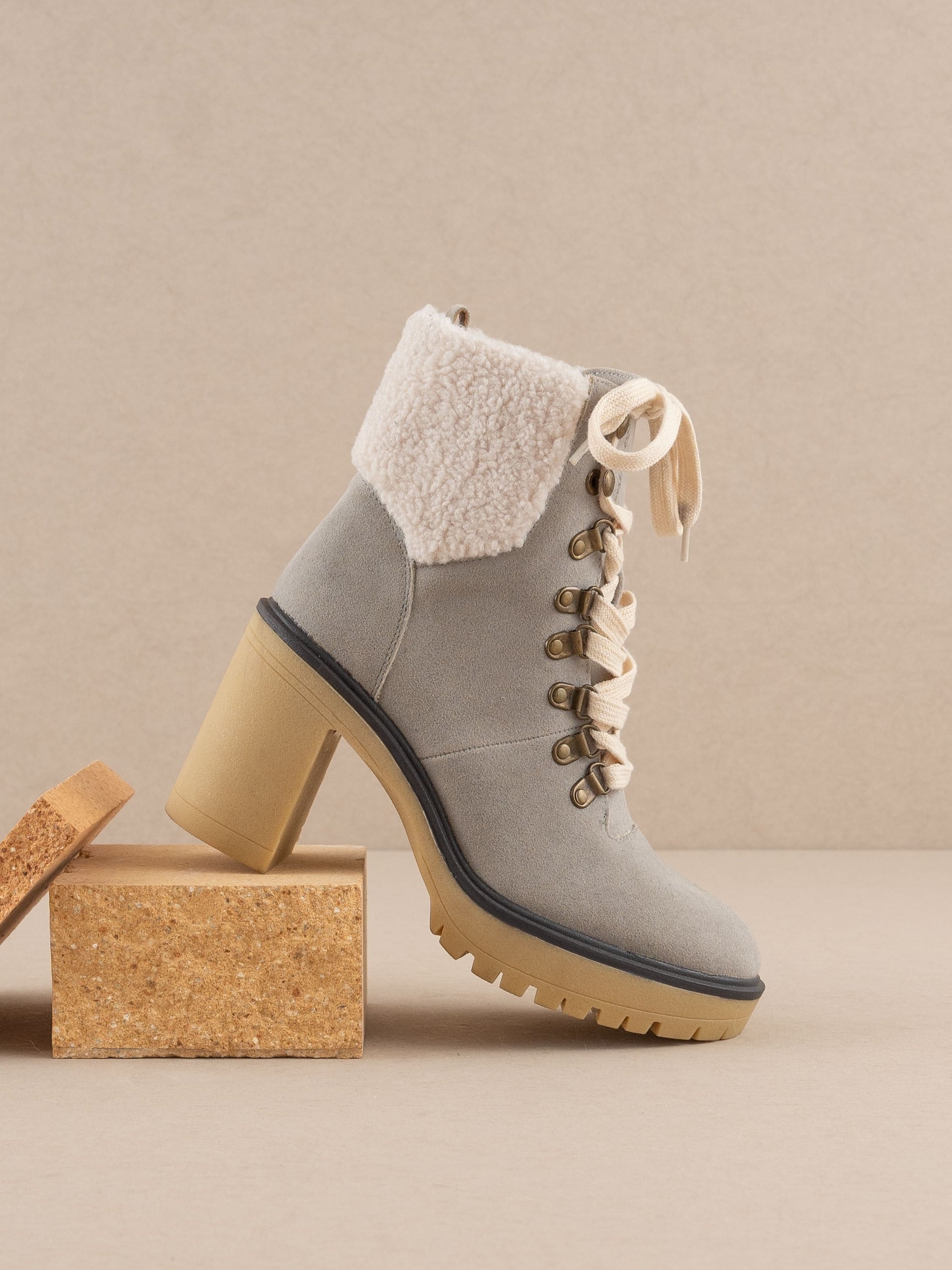 RARA Boutique heeled platform lace-up sherpa boots with chunky soles and cozy fur lining, stylish for cold weather.