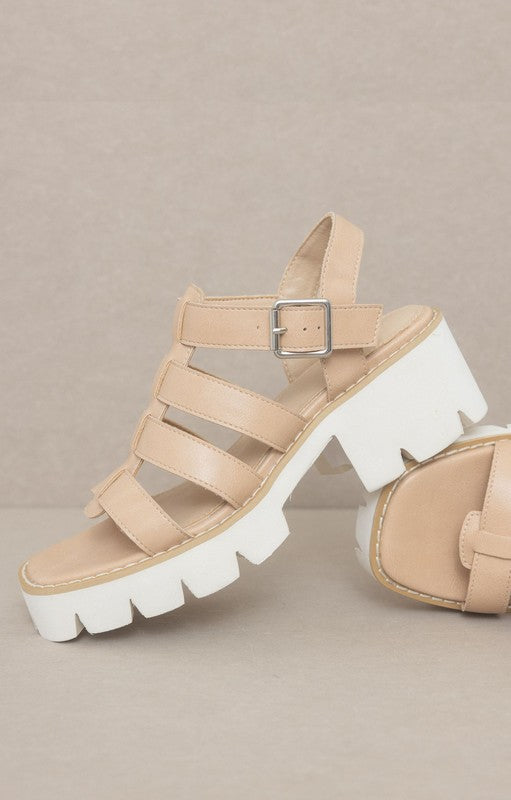 RARA Boutique Lug Sole Heeled Gladiator Sandals with multiple straps and ankle buckle, stylish open-toe design.