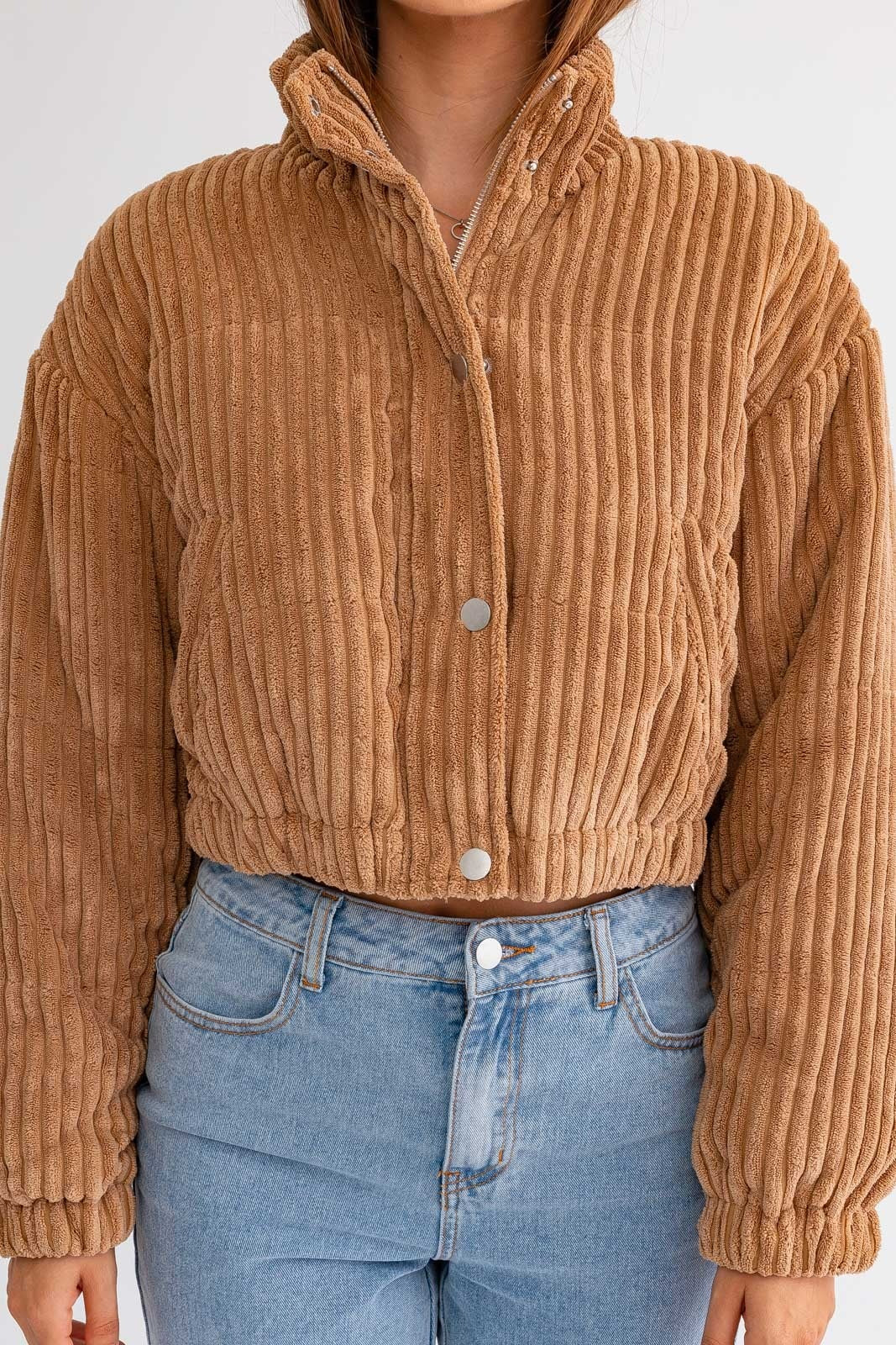 Le Lis cropped corduroy puffer jacket by RARA Boutique, shown in a stylish, fitted design with a stand-up collar and puffy texture.