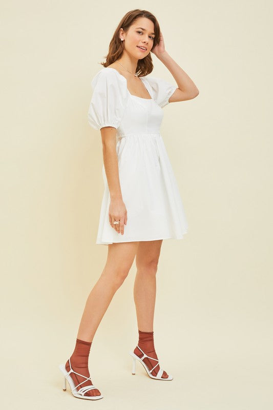 Puff Sleeve BabyDoll Dress with Bow Back and Pockets - RARA Boutique 