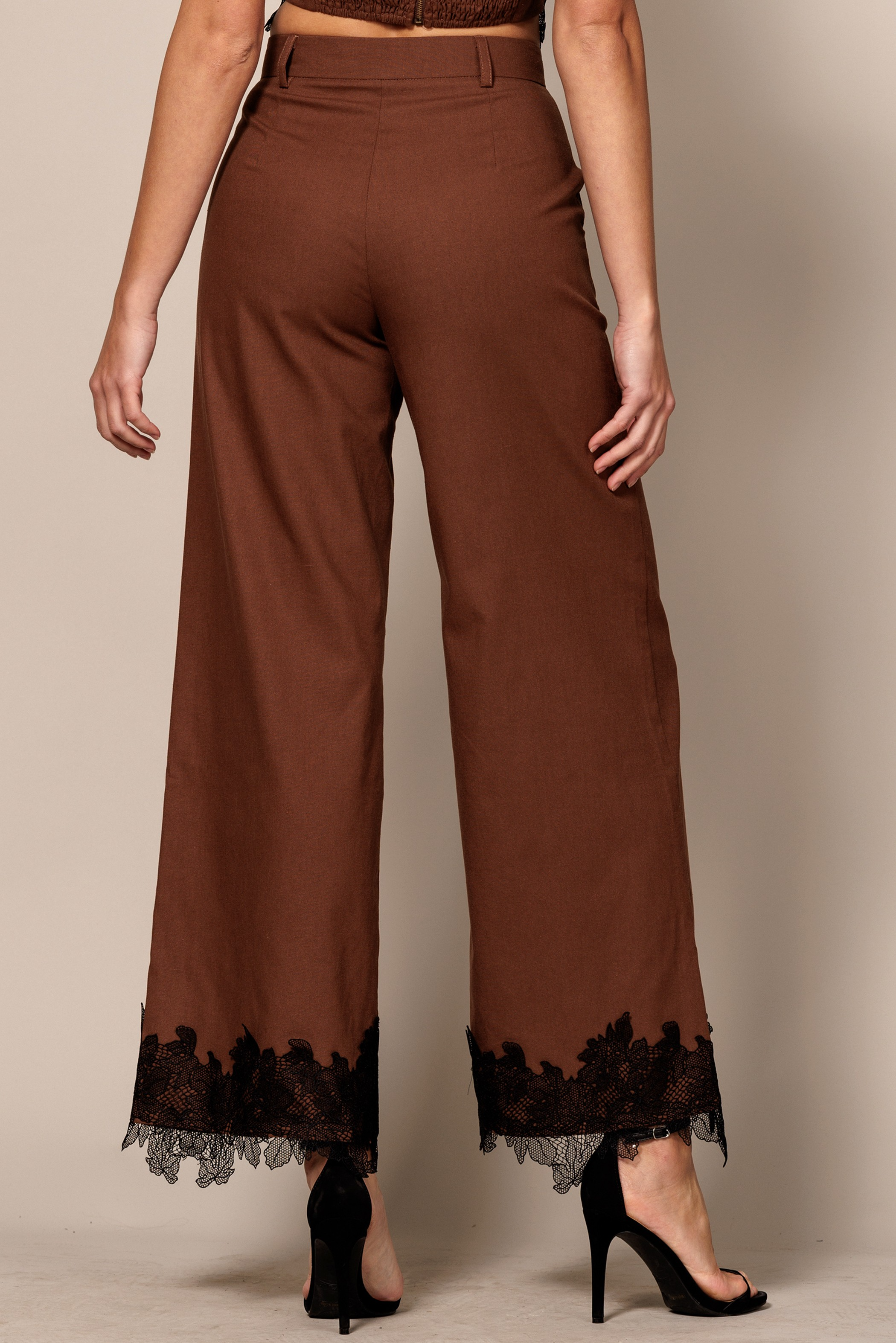 RARA Boutique lace trim hem wide-leg trouser pants featuring elegant design and flowing fabric in a stylish, comfortable fit.