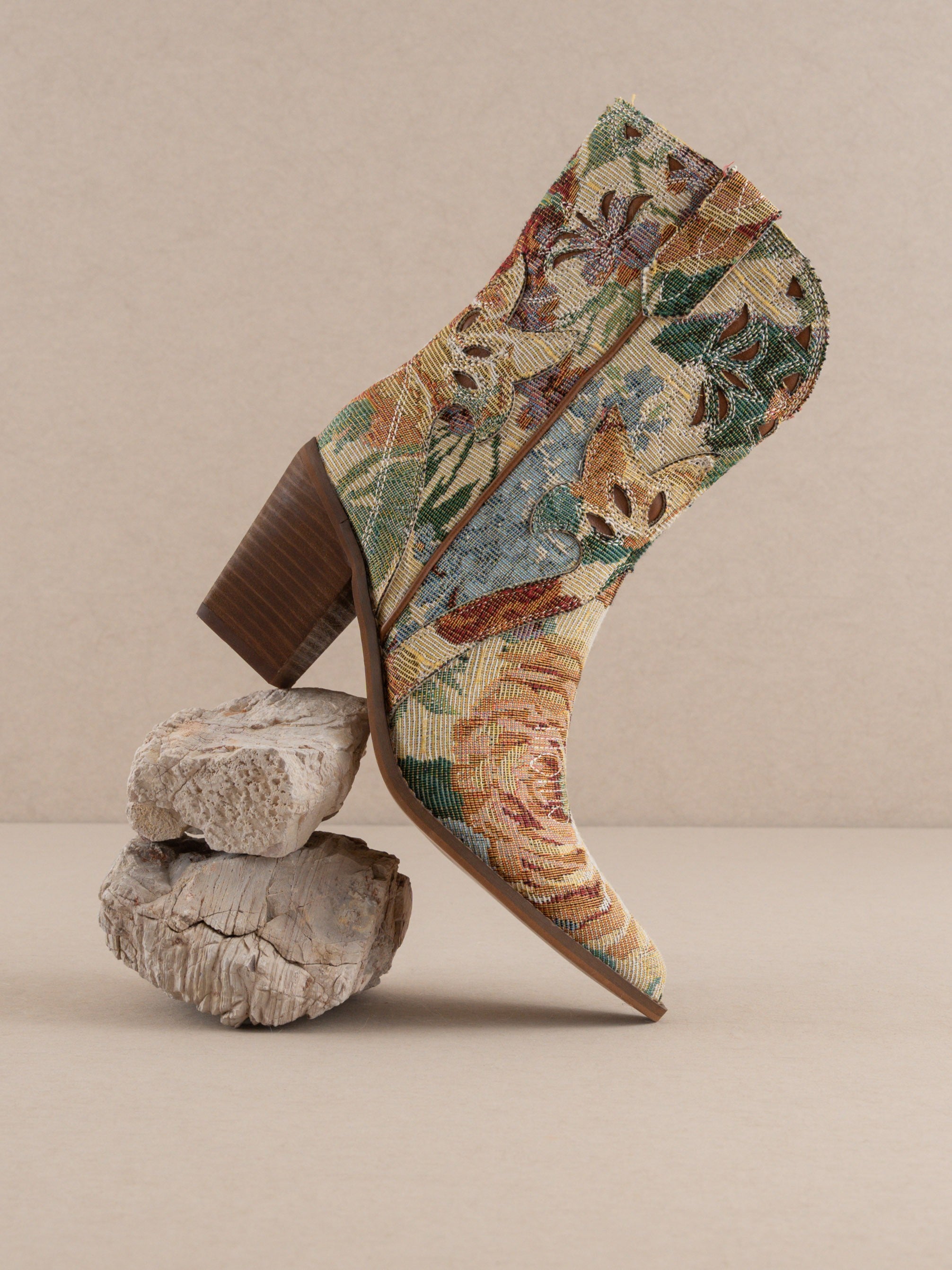 RARA Boutique floral jacquard tapestry western boot with paneled design and intricate floral patterns, stylish cowboy footwear