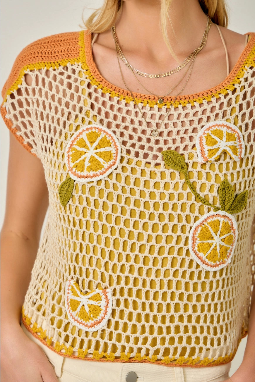 Open-knit crochet citrus fruit top by Mystree, lightweight shirt with vibrant citrus pattern, perfect for warm weather.
