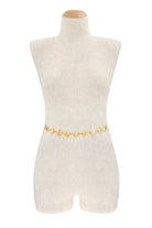 Scallop seashell textured link chain belt with metallic finish, stylish accessory from RARA Boutique.