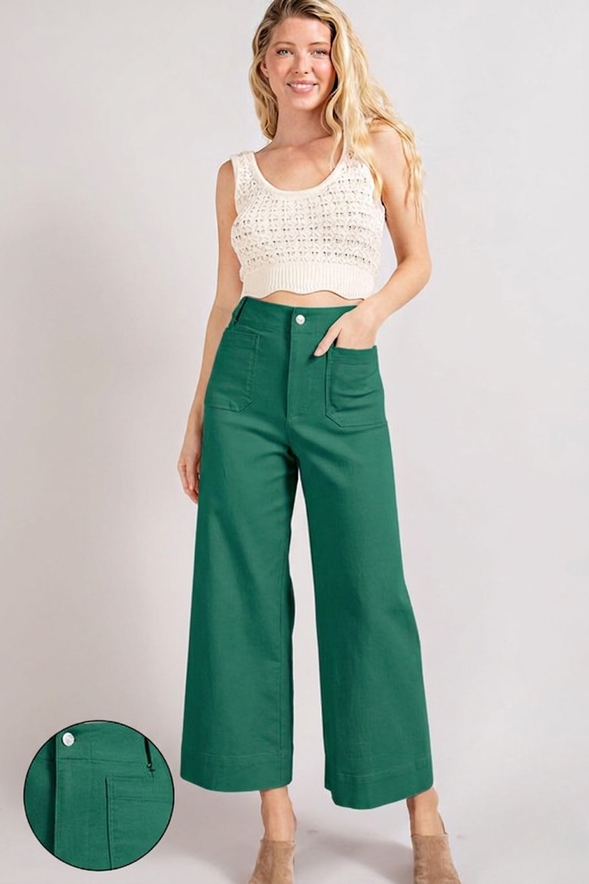 Soft Wash Wide Leg Jeans by RARA Boutique featuring relaxed fit and light wash denim, styled with rolled cuffs.