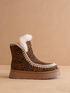 OASIS SOCIETY Joyce dark cheetah shearling trim platform winter boot with rugged sole and cozy shearling lining.