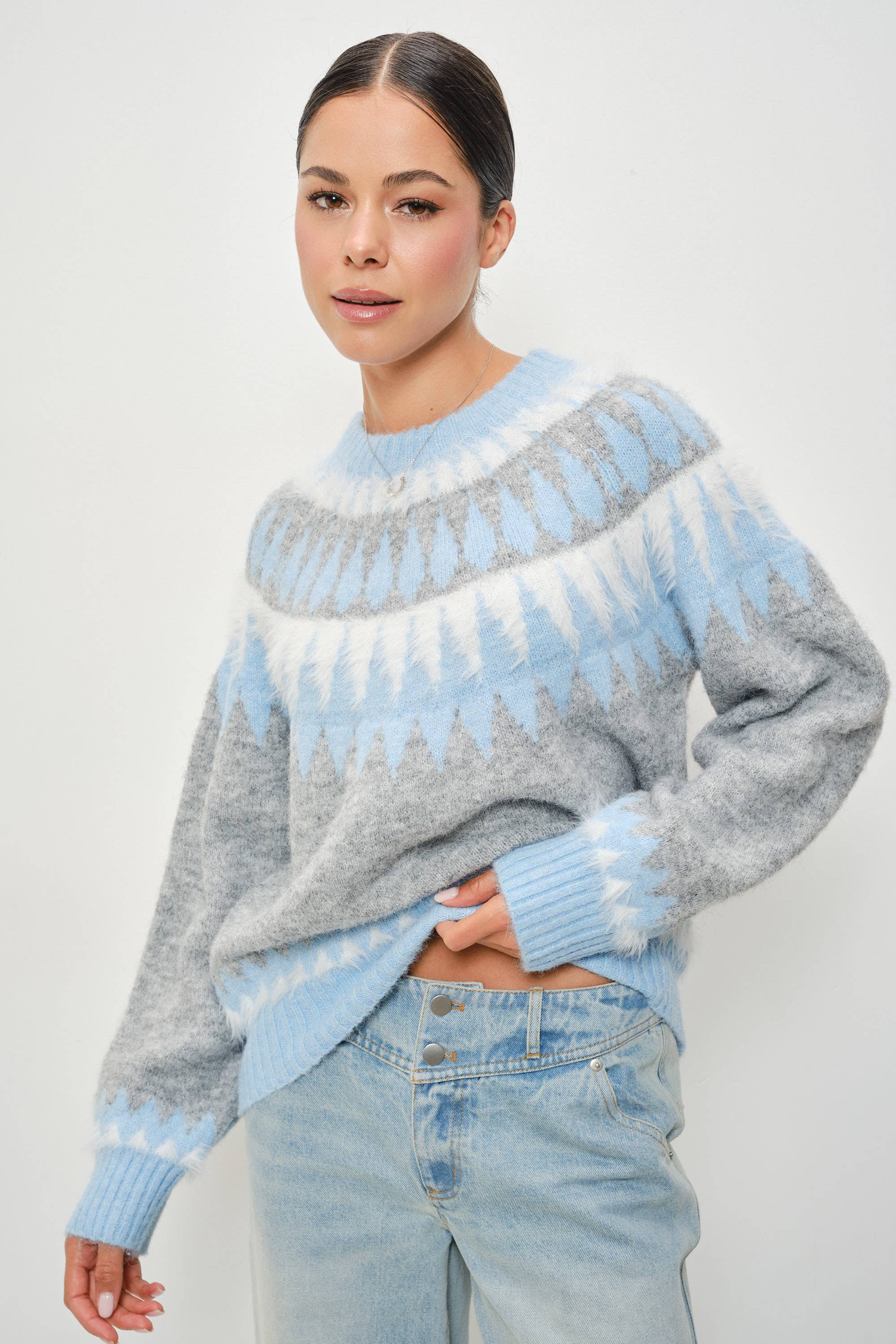 Kenzies Faire Isle crewneck pullover by Pretty Garbage in soft knit fabric, featuring a cozy fit and detailed pattern on the front.