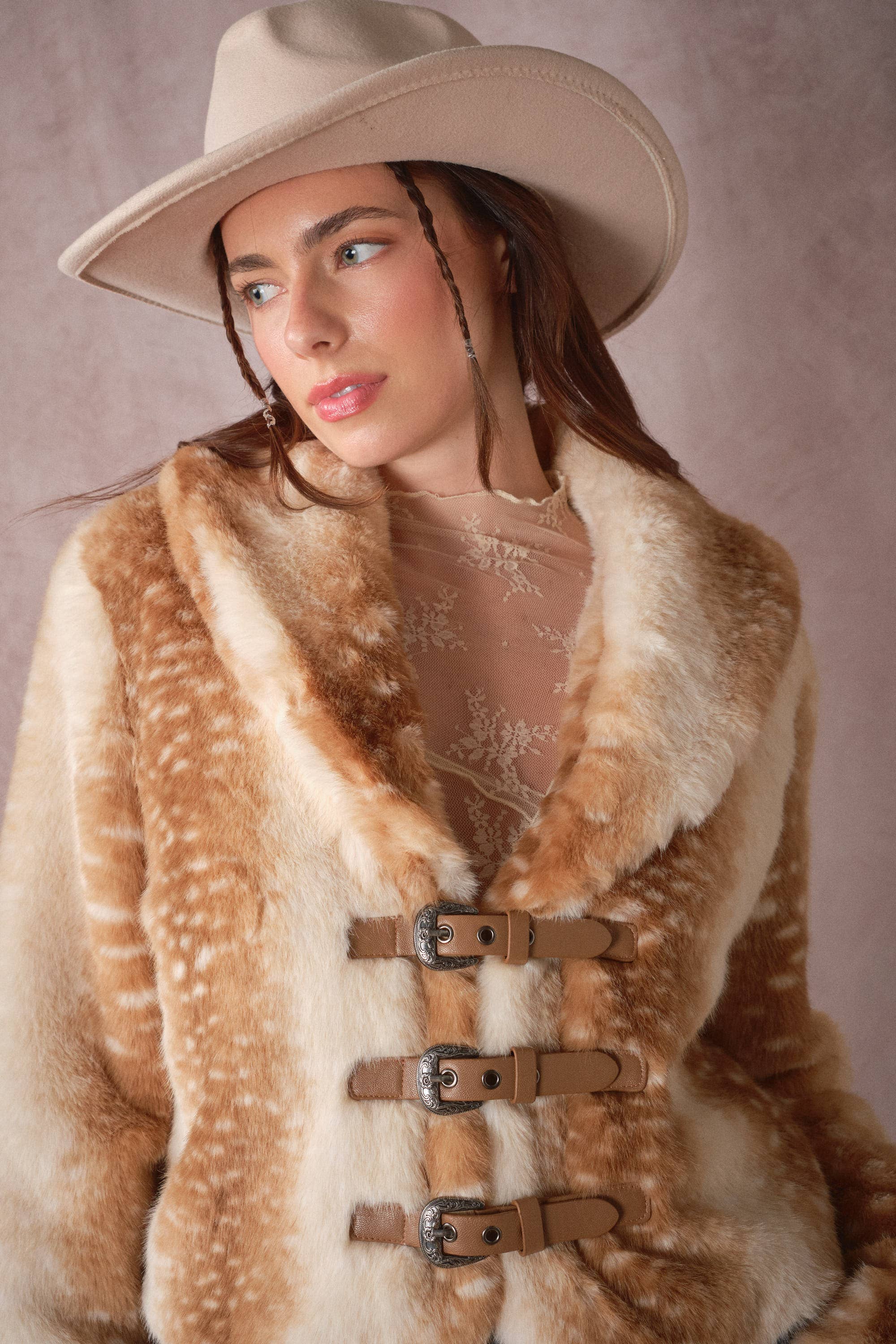 Blue B 25004J buckled faux fur jacket with deer print, featuring a stylish buckle closure and soft, textured fur material.