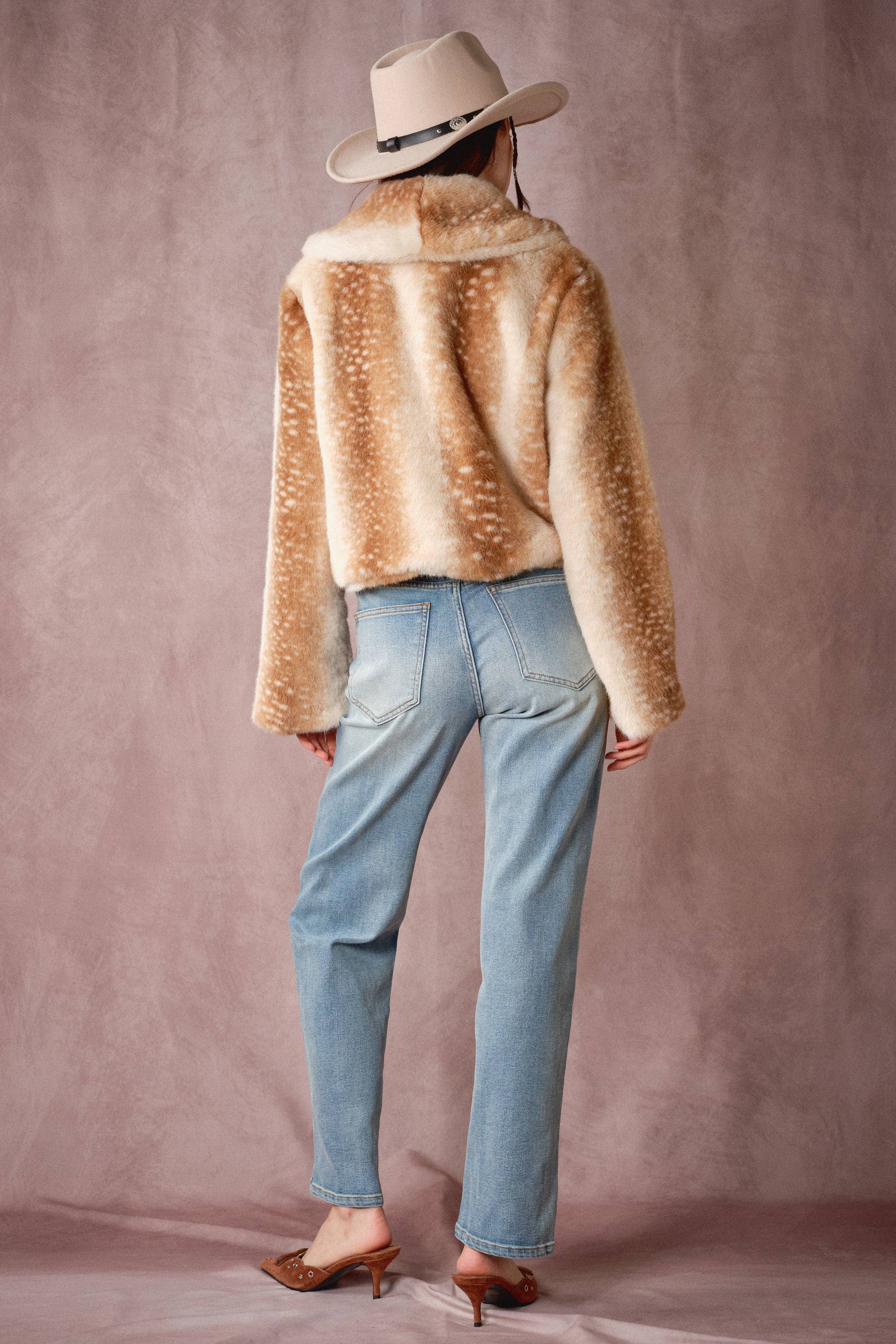Blue B Buckled Deer Print Faux Fur Jacket showing brown deer print and buckle details on soft, cozy faux fur material.