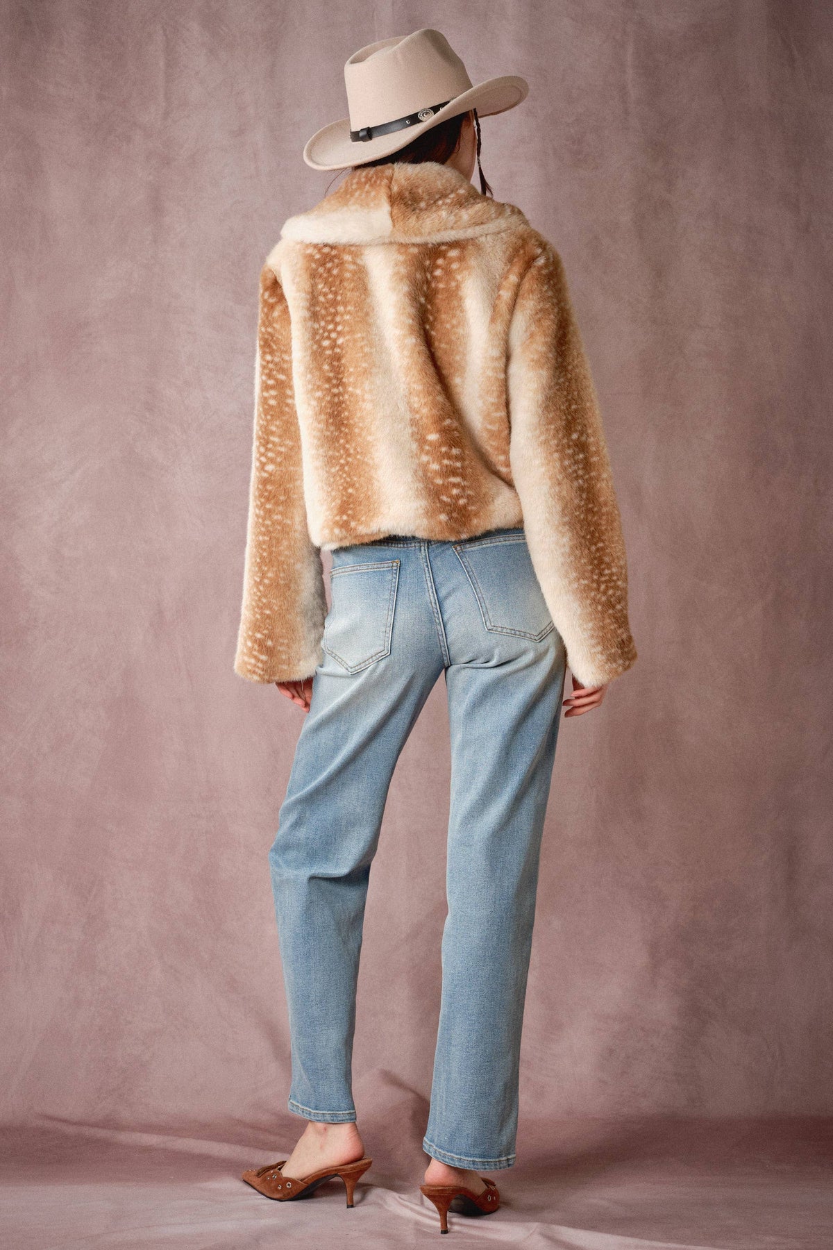 Blue B Buckled Deer Print Faux Fur Jacket showing brown deer print and buckle details on soft, cozy faux fur material.