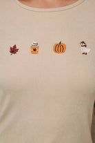 Round neck long sleeve ribbed top with fall-themed embroidery by Sunday Edition, featuring autumn-inspired designs.