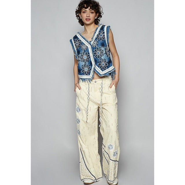 RARA Boutique crochet floral V-neck denim vest with intricate floral crochet details and classic sleeveless design.