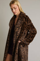 LE LIS faux fur long coat jacket with plush, textured fur in a stylish, elegant design.
