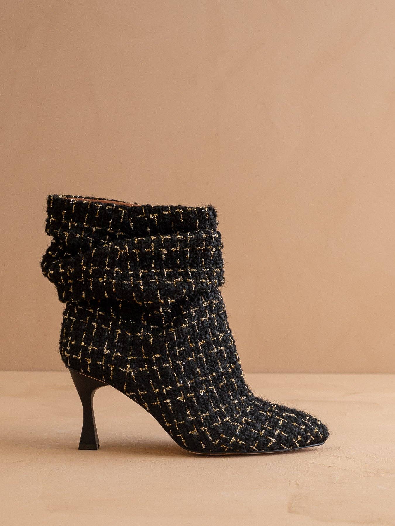 Black tweed slouch heel fall bootie from Oasis Society featuring a stylish design and chunky heel.
