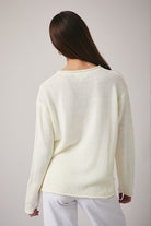RARA Boutique Coastal Seashell lightweight knit sweater with ocean-inspired pattern, soft and cozy for casual wear.