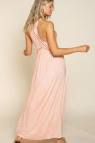 RARA Boutique baby doll side slit cut-out maxi dress in soft fabric, featuring a stylish design and elegant silhouette.