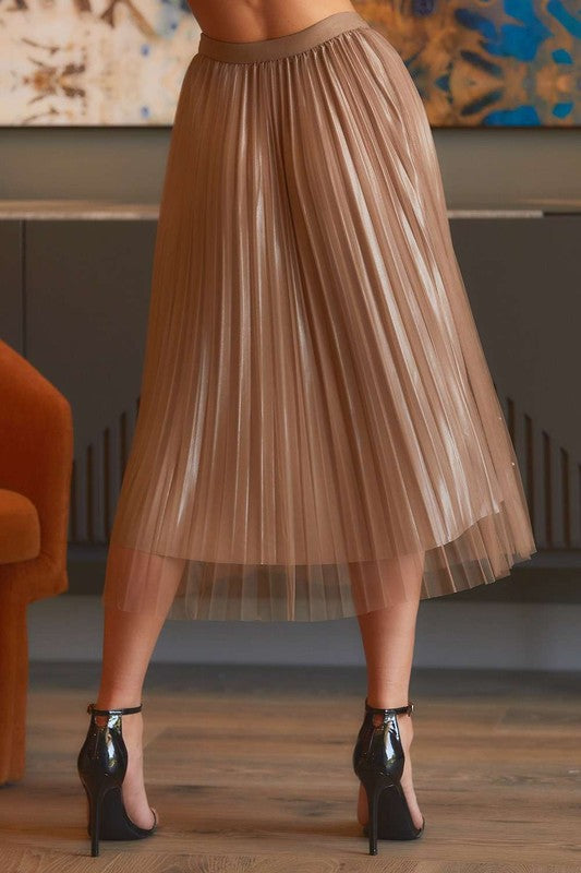 Pearl-embellished pleated mesh midi skirt by RARA Boutique, showcasing intricate pearl details and flowing pleats.