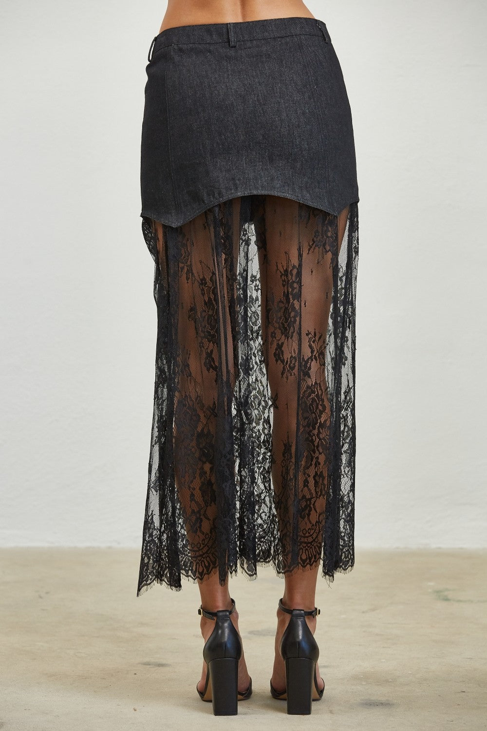 Layered denim lace contrast midi skirt from Edit by Nine featuring a stylish, tiered design with intricate lace details.
