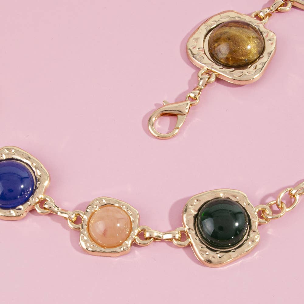 Gemstone cabochon station chain belt with colorful stones and metal links from Collections by Fame Accessories.