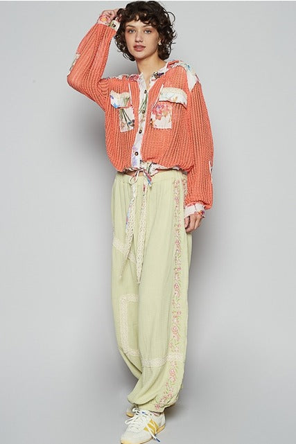 RARA Boutique floral patch open knit crochet hoodie jacket with colorful floral embroidery and lightweight design.