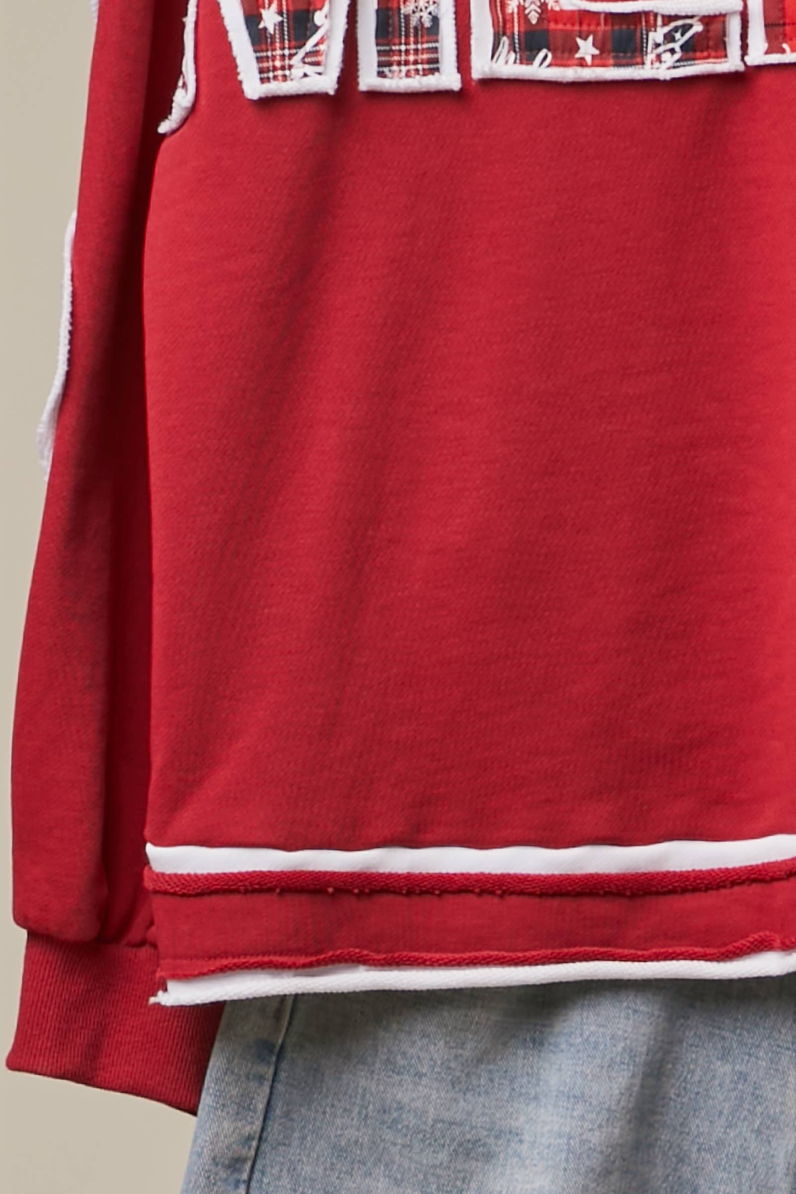 Mello Tuesday Holiday Merry Christmas letter sweatshirt featuring festive text and cozy knit fabric on a holiday-themed sweater.