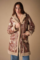 Blue B 25074J Western printed faux leather coat with floral design and button details, stylish and lightweight outerwear.