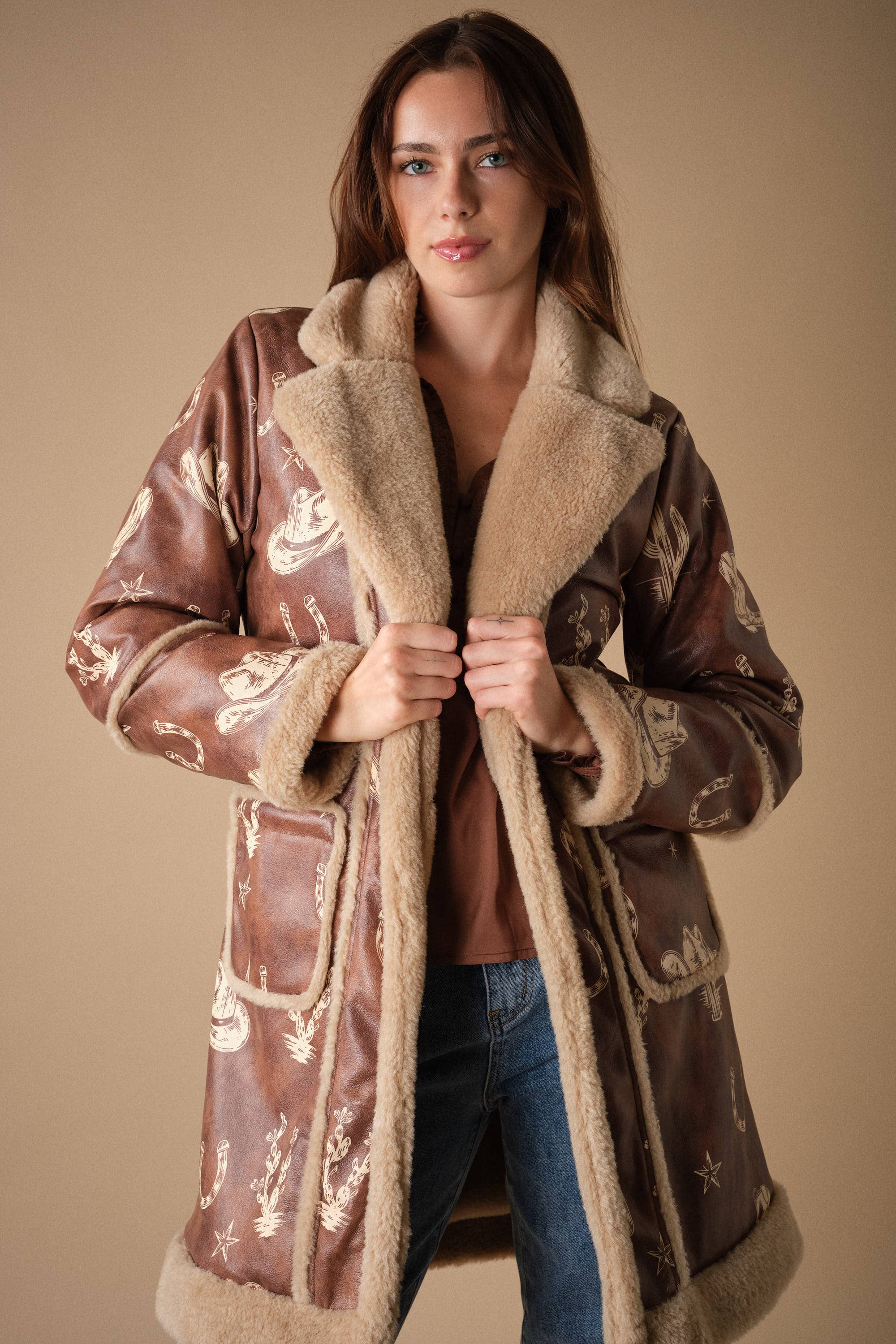 Blue B Western printed faux leather coat with colorful Western-inspired patterns and a stylish tailored fit.