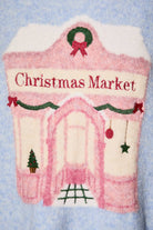 LE LIS Christmas Shop graphic long sleeve crew neck sweater featuring festive holiday design and comfortable knit fabric.