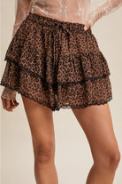 Leopard tiered ruffle lace trim skort by RARA Boutique, featuring a stylish animal print, ruffles, and lace detailing.