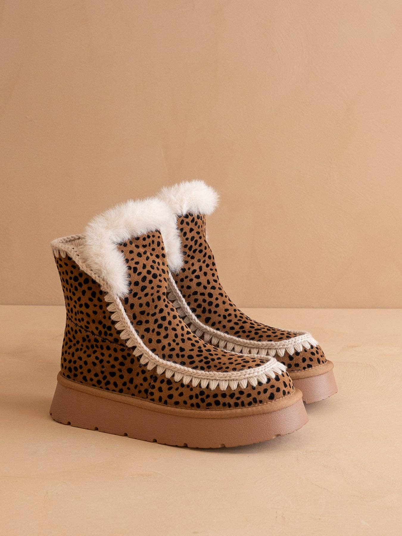 OASIS SOCIETY Joyce dark cheetah shearling trim platform winter boot with rugged sole and cozy shearling lining.
