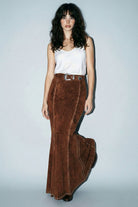 Skylar Rose suede studded maxi skirt with a flowing design and silver stud embellishments on soft suede fabric.