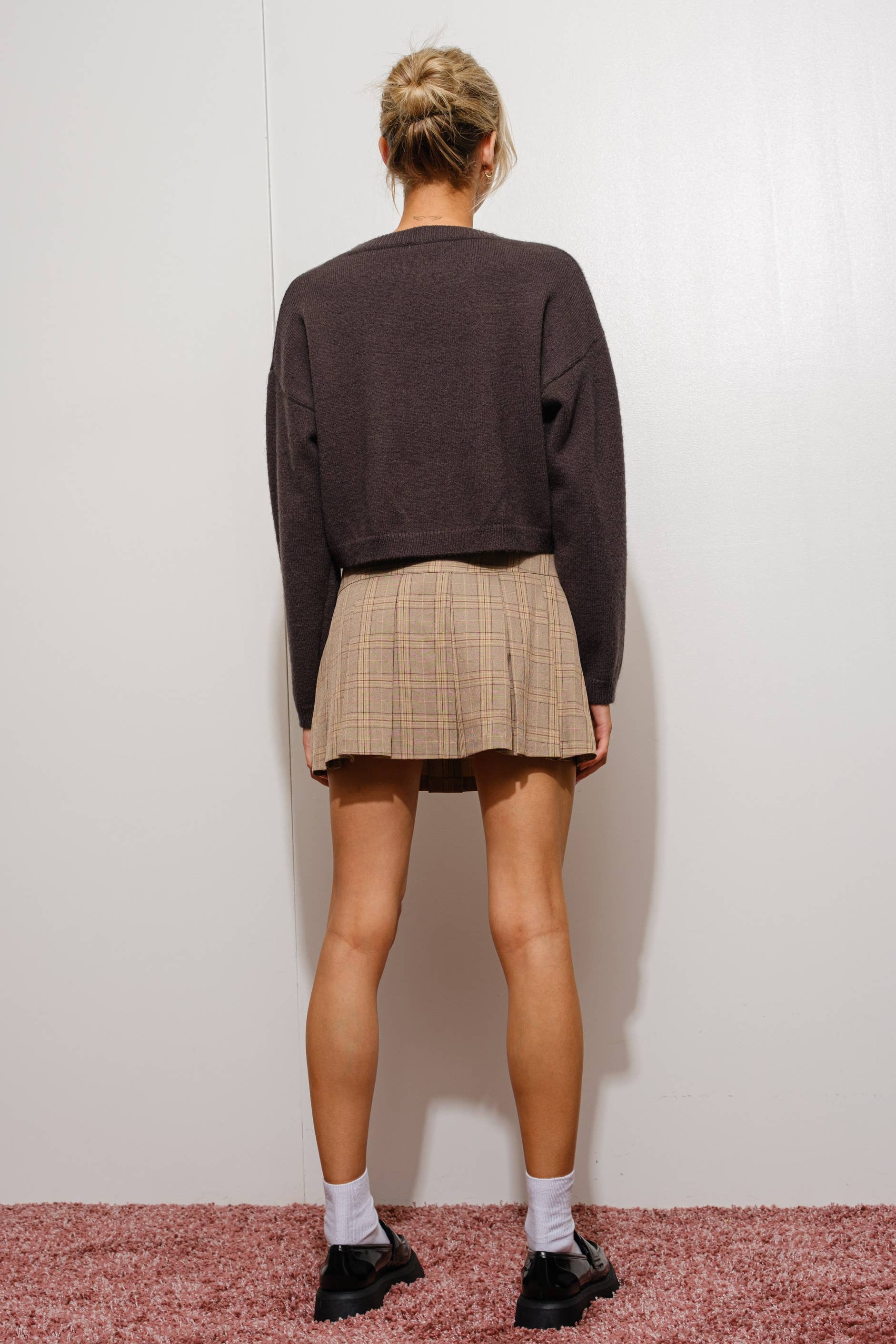 Pretty Garbage Kaina Martini sweater, cozy knit in a stylish design, shown on a model with a neutral background.