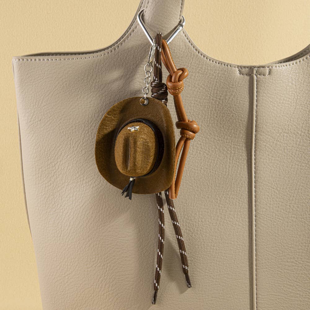 Mini cowboy hat Western rope bag charm with rustic details, perfect for accessories and keychains.
