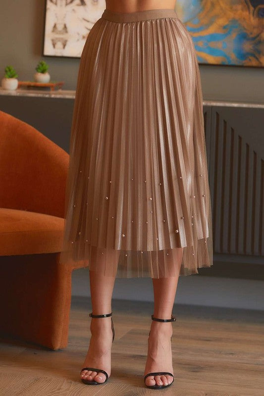 Pearl-embellished pleated mesh midi skirt by RARA Boutique, featuring elegant pleats and decorative pearl accents.