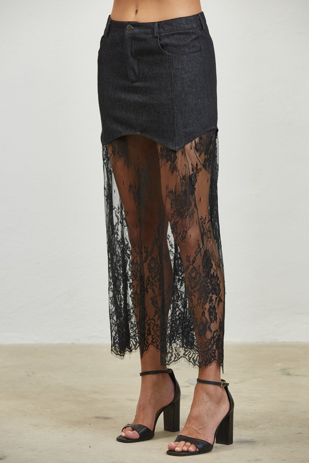Layered denim lace contrast midi skirt from RARA Boutique featuring a stylish, layered design and feminine lace details.